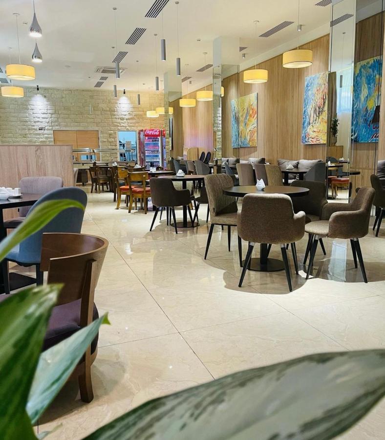 New Athos Abaash Hotel Afon מראה חיצוני תמונה